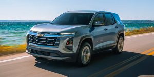 2025 Chevrolet Blazer driving along coastal road 